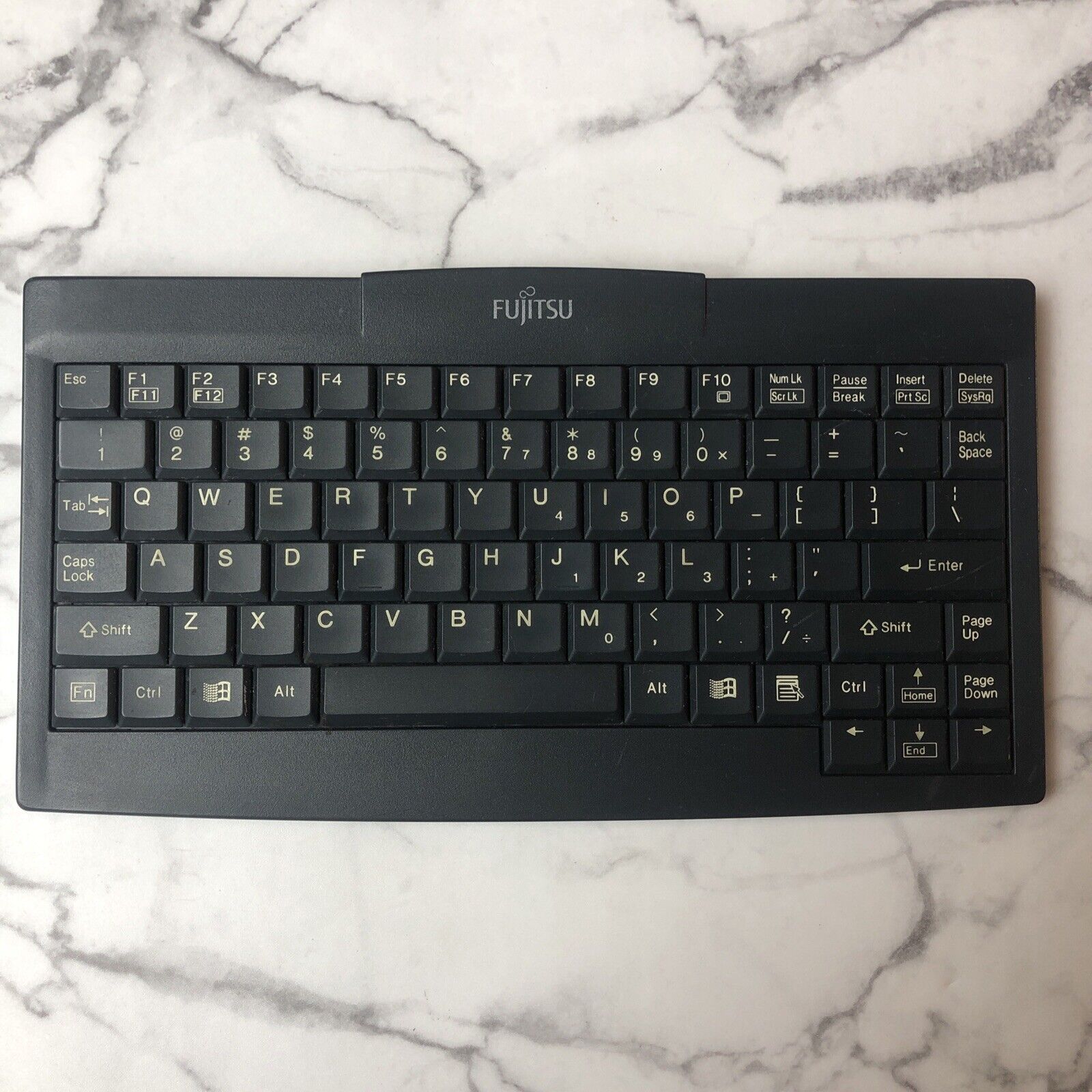 Fujitsu IR-Wireless Keyboard FMWKB4A Wireless Mobile Compact Space Saver Vintage. Available Now for $37.60